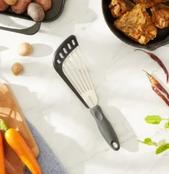 This versatile slotted turner helps drain excess oil while making flipping and serving quick and effortless.