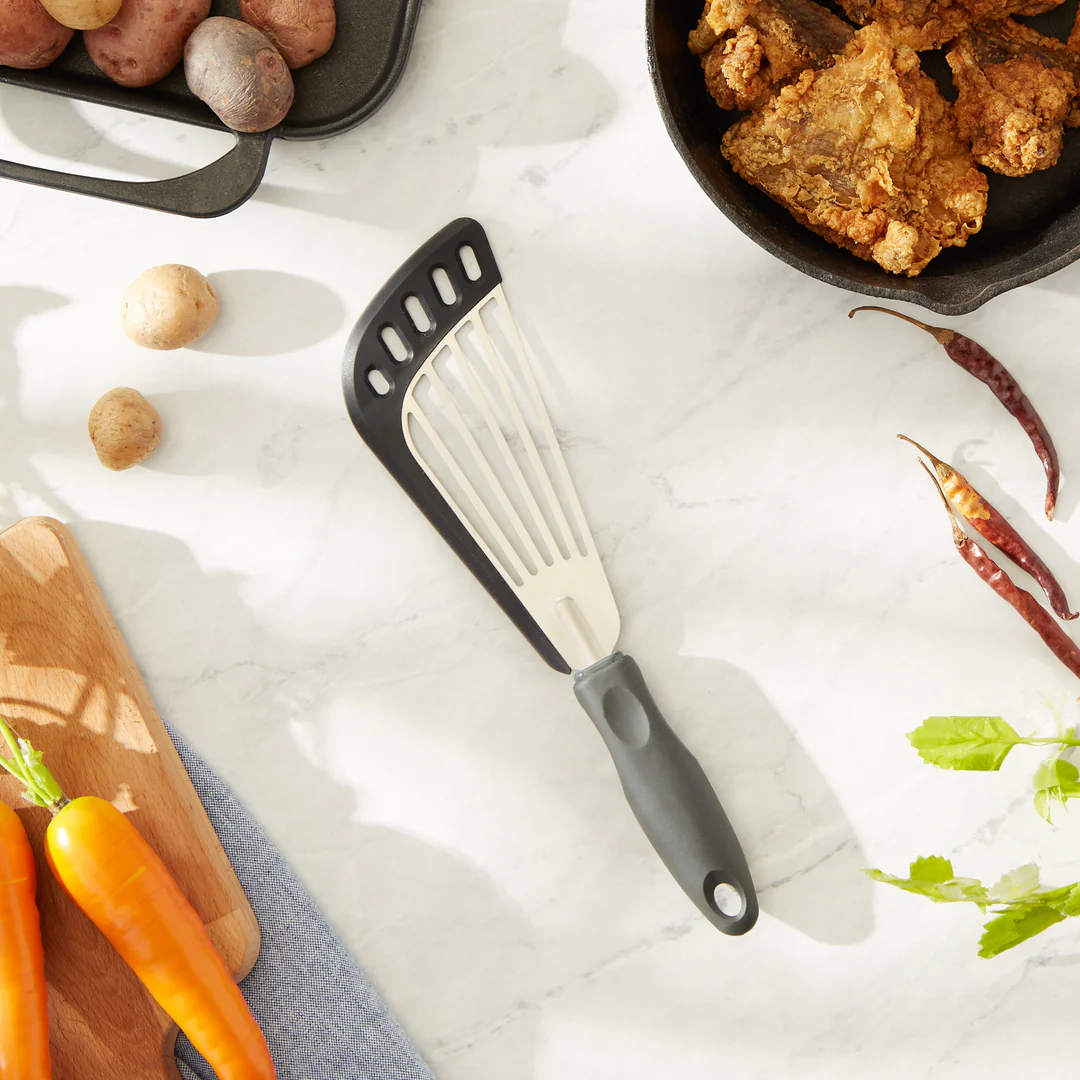 This versatile slotted turner helps drain excess oil while making flipping and serving quick and effortless.
